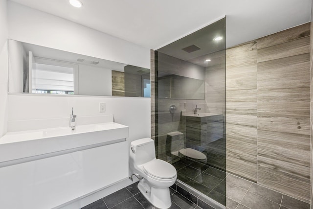 242 S 1st St Unit 1D, Brooklyn, NY 11211 - bathroom featuring tile patterned floors, a walk in shower, toilet, vanity, and recessed lighting