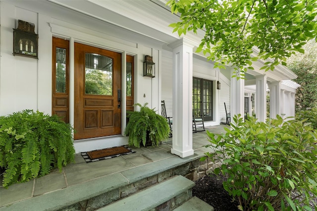 doorway to property with a porch