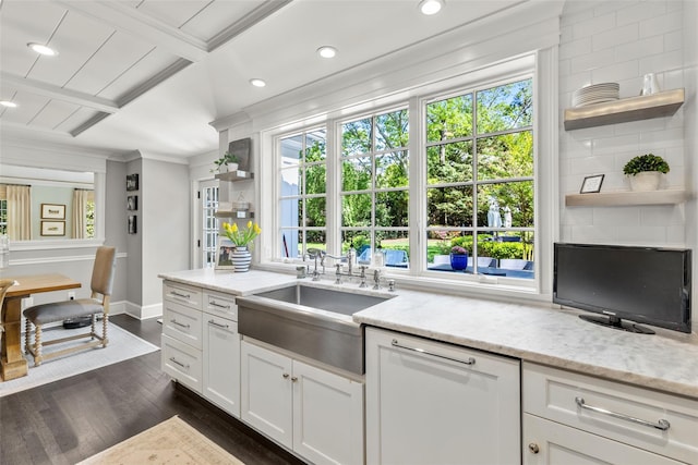 kitchen with open shelves, a sink, dark wood-type flooring, light stone countertops, and recessed lighting