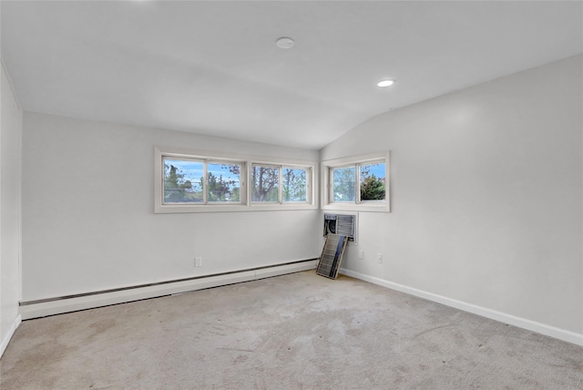 unfurnished room with a baseboard radiator, baseboards, vaulted ceiling, carpet flooring, and recessed lighting