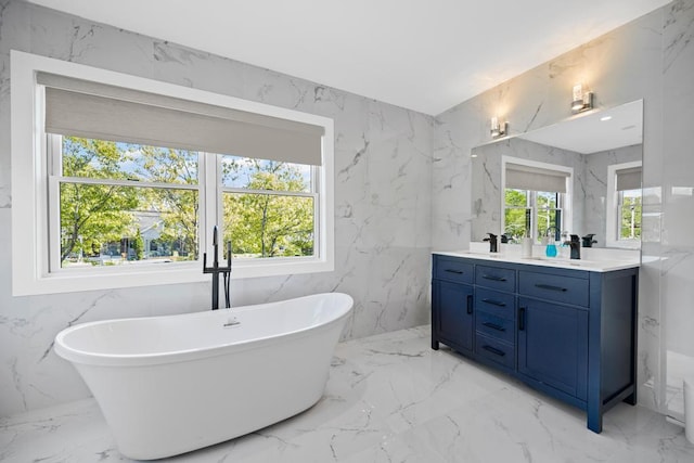 128 Priscilla Ave, Flanders, NY 11901 - full bath featuring marble tiled flooring, stone wall, and double vanity