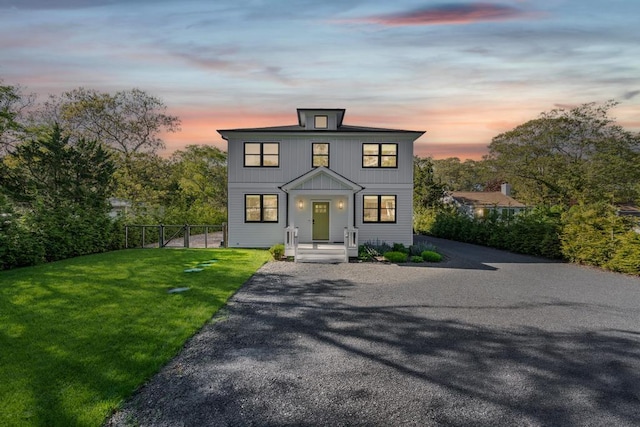 128 Priscilla Ave, Flanders, NY 11901 - view of front facade with a gate
