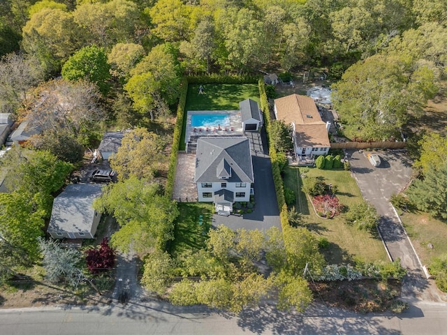 128 Priscilla Ave, Flanders, NY 11901 - aerial view of property and surrounding area featuring a heavily wooded area and a pool area