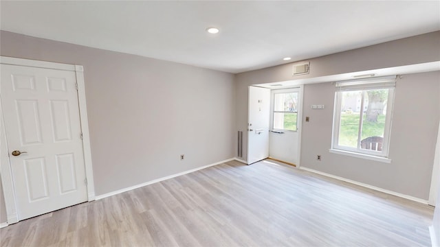 35 Navajo Ct Unit 35, Coram, NY 11727 - unfurnished room featuring light wood finished floors, recessed lighting, and baseboards