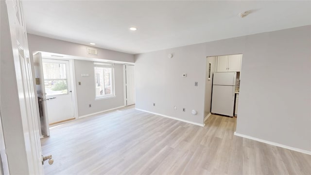 35 Navajo Ct Unit 35, Coram, NY 11727 - unfurnished room featuring light wood-style flooring, baseboards, recessed lighting, and a smoke detector