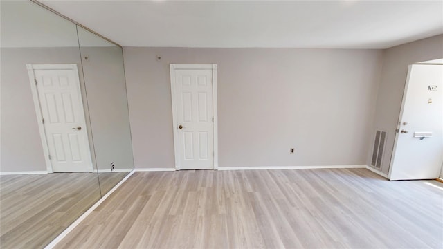 35 Navajo Ct Unit 35, Coram, NY 11727 - spare room with light wood-style floors and baseboards