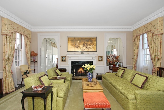 2 Wallis Ln, Nissequogue, NY 11780 - living area featuring crown molding, a premium fireplace, wallpapered walls, and carpet