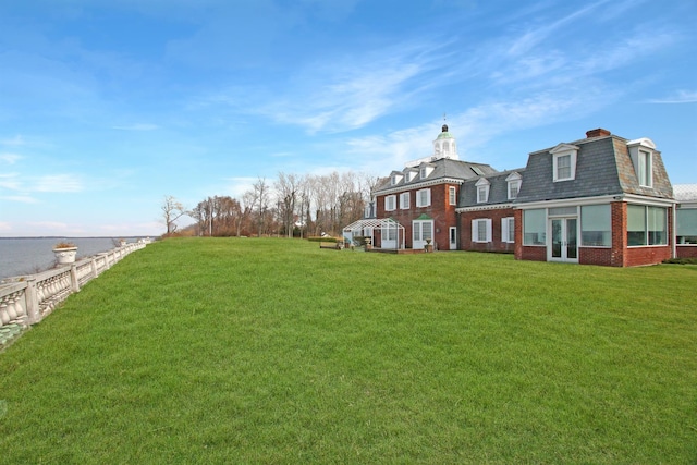 2 Wallis Ln, Nissequogue, NY 11780 - view of green lawn featuring french doors and a water view