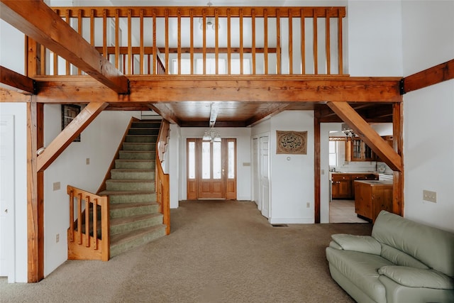 26 Beckys Hill Rd, Hurleyville, NY 12747 - unfurnished living room with carpet and stairs