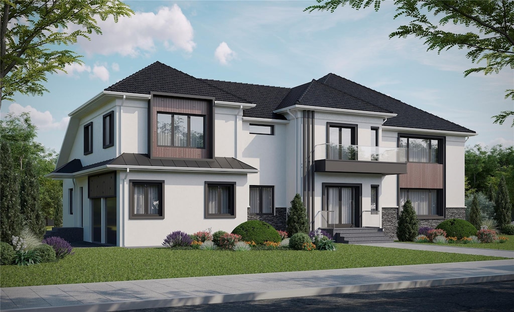 17 Wallenberg Cir, Monsey, NY 10952 - view of front of home with a balcony, stucco siding, a front yard, and stone siding