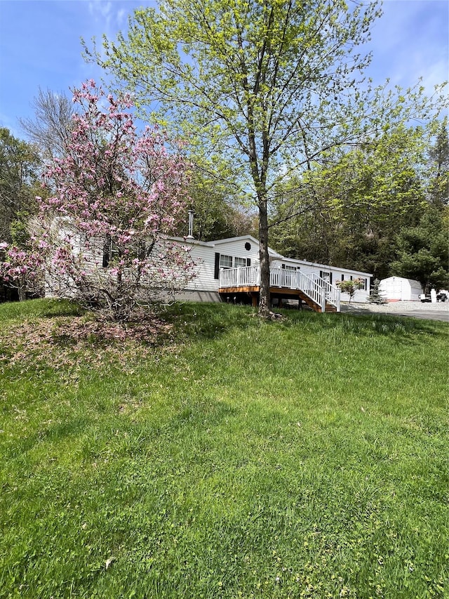 265 Old Tacy Rd Unit Tr95, Swan Lake, NY 12783 - view of green lawn featuring a wooden deck