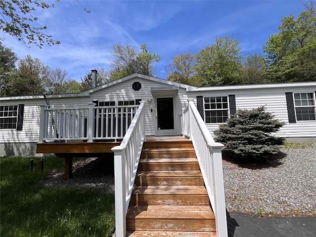 265 Old Tacy Rd Unit Tr95, Swan Lake, NY 12783 - view of front of home with a wooden deck