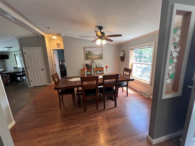 265 Old Tacy Rd Unit Tr95, Swan Lake, NY 12783 - dining room featuring ornamental molding, dark wood-style floors, ceiling fan, and baseboards