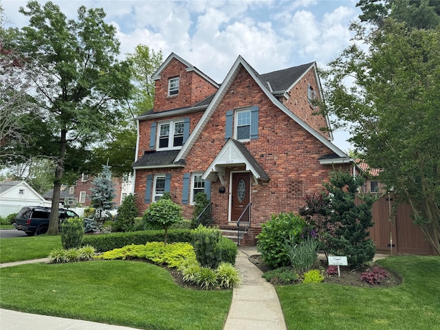 163-18 Cryders Ln, Whitestone, NY 11357 - english style home with brick siding and roof with shingles