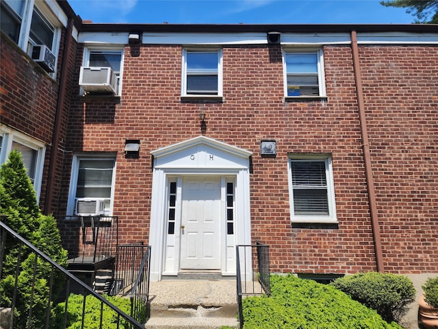79 N Broadway Unit H, White Plains, NY 10603 - view of front of property featuring brick siding and cooling unit