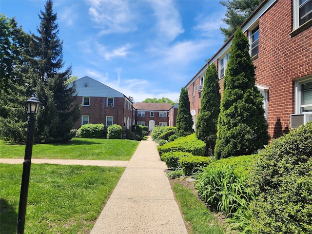 79 N Broadway Unit H, White Plains, NY 10603 - view of property's community with a yard and a residential view