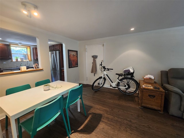 79 N Broadway Unit H, White Plains, NY 10603 - dining space featuring dark wood-type flooring, ornamental molding, and recessed lighting