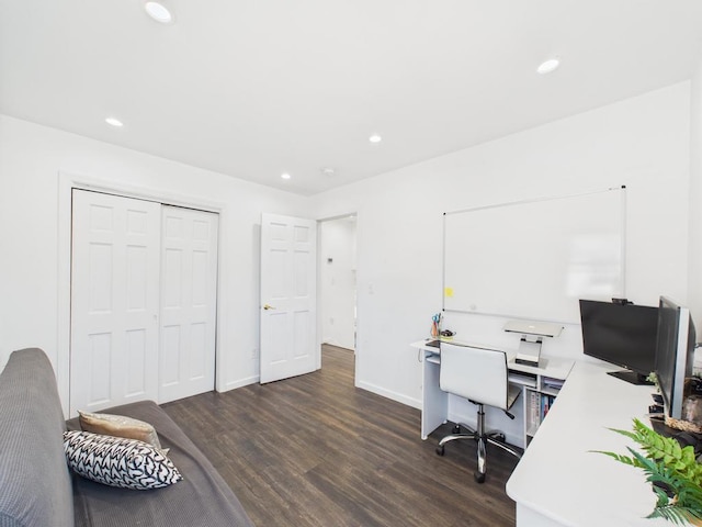 office space featuring dark wood finished floors, recessed lighting, and baseboards