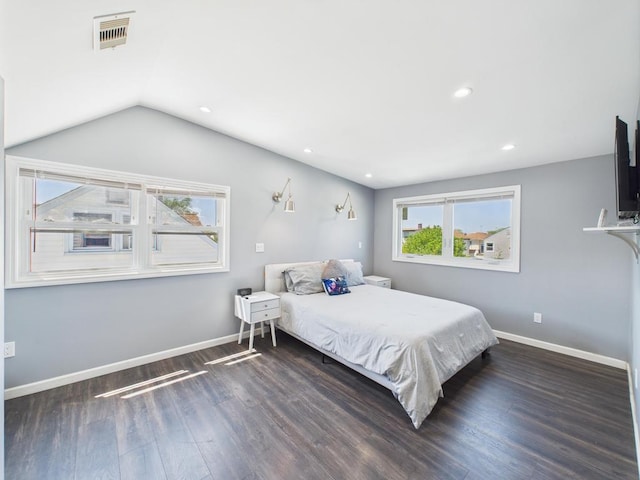 bedroom with dark wood-style flooring, baseboards, lofted ceiling, and recessed lighting