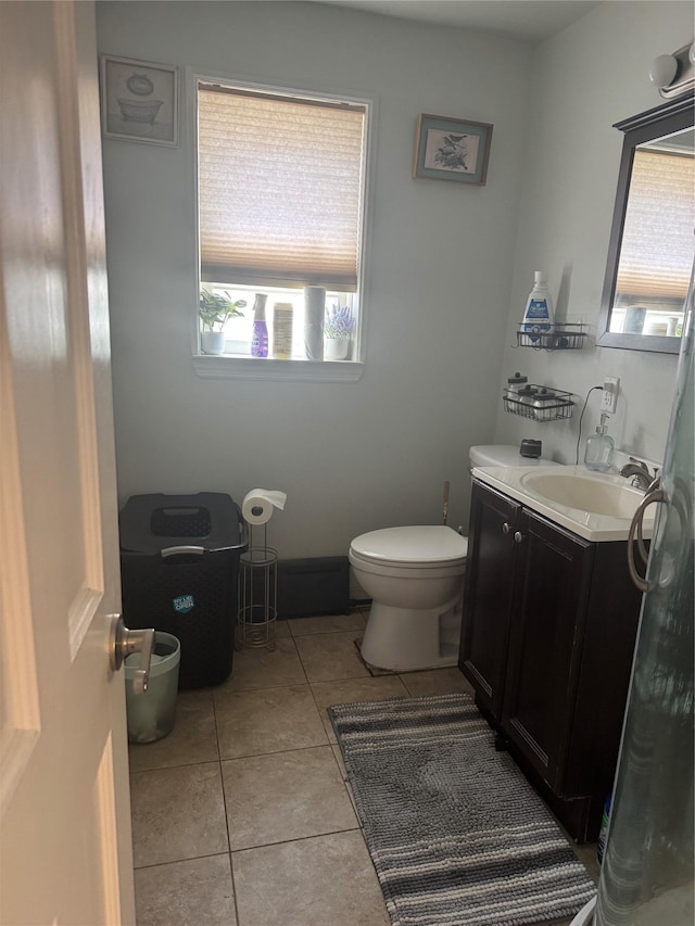 163-33 90th St, Howard Beach, NY 11414 - half bath featuring toilet, vanity, and tile patterned floors