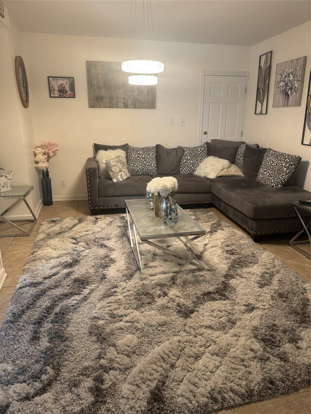 163-33 90th St, Howard Beach, NY 11414 - tiled living room featuring baseboards