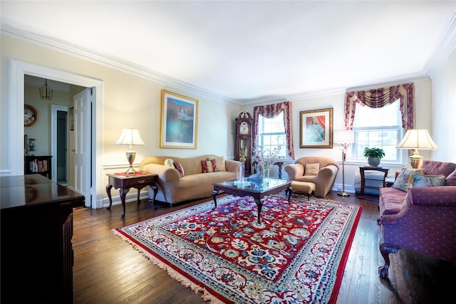 living room with ornamental molding, dark wood-type flooring, and baseboards