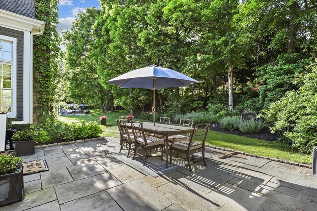 2 Cerf Ln, Mount Kisco, NY 10549 - view of patio / terrace featuring outdoor dining space and view of wooded area