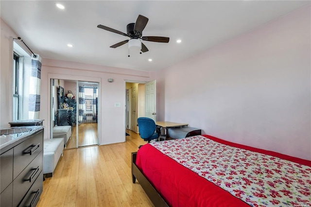 bedroom featuring light wood finished floors, recessed lighting, and a ceiling fan