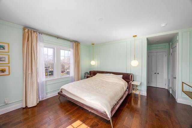 7203 Ingram St, Forest Hills, NY 11375 - bedroom with dark wood-type flooring and baseboards