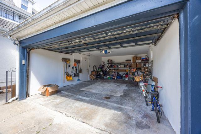 7203 Ingram St, Forest Hills, NY 11375 - garage with a garage door opener