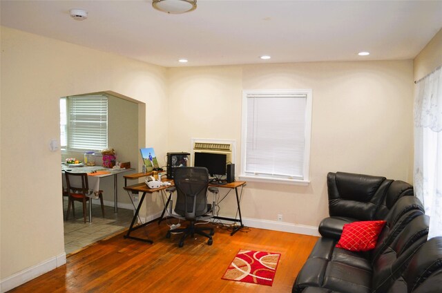 110 Powell Pl, Hempstead, NY 11550 - office area with wood finished floors, recessed lighting, baseboards, and healthy amount of natural light