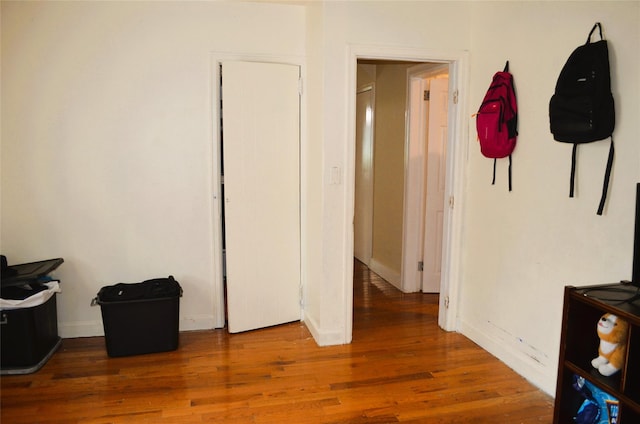 110 Powell Pl, Hempstead, NY 11550 - corridor featuring wood finished floors and baseboards