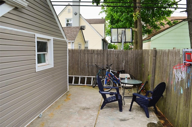 110 Powell Pl, Hempstead, NY 11550 - fenced backyard featuring a patio area