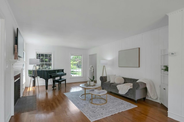 40 Brookby Rd, Scarsdale, NY 10583 - living area with wood finished floors and a fireplace with flush hearth