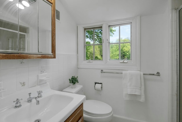 40 Brookby Rd, Scarsdale, NY 10583 - bathroom featuring an enclosed shower, toilet, vanity, and lofted ceiling
