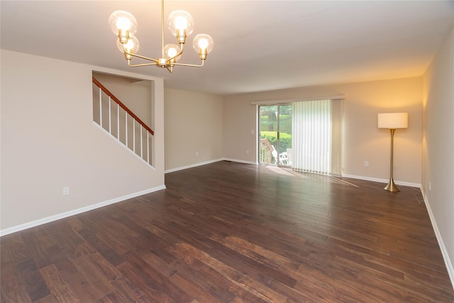 9 Clara Ct, Cortlandt Manor, NY 10567 - unfurnished room featuring dark wood finished floors, a chandelier, stairs, and baseboards