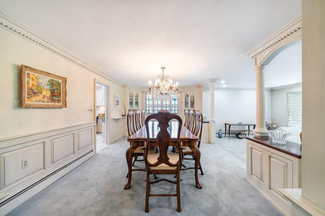 1 Karin Ct, East Northport, NY 11731 - dining area featuring baseboard heating, a chandelier, light carpet, ornamental molding, and arched walkways