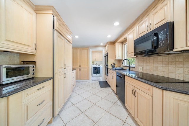 1 Karin Ct, East Northport, NY 11731 - kitchen with black appliances, washer / dryer, a sink, decorative backsplash, and recessed lighting