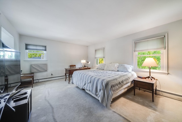 1 Karin Ct, East Northport, NY 11731 - bedroom featuring a baseboard heating unit, carpet flooring, baseboards, and a wall unit AC