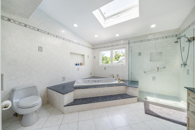 1 Karin Ct, East Northport, NY 11731 - bathroom with toilet, a shower stall, a garden tub, tile patterned flooring, and a skylight
