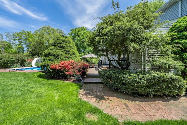 1 Karin Ct, East Northport, NY 11731 - view of green lawn featuring an outdoor pool and a deck