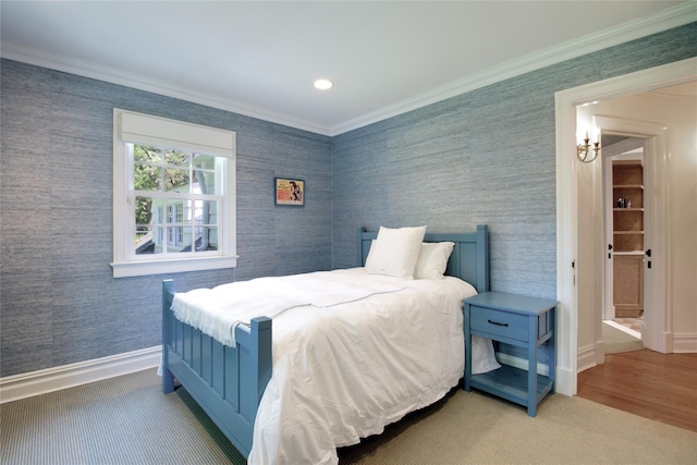 bedroom with crown molding, baseboards, a chandelier, recessed lighting, and carpet flooring