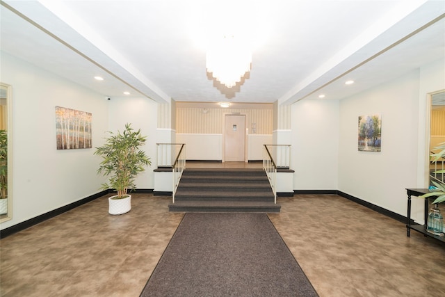common area featuring stairway and recessed lighting