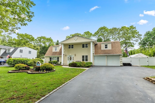 8 Wichard Blvd, Commack, NY 11725 - view of front of property featuring a gate, asphalt driveway, a shingled roof, and stucco siding