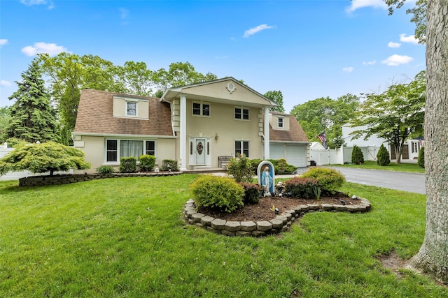 8 Wichard Blvd, Commack, NY 11725 - neoclassical / greek revival house with stucco siding, driveway, and a shingled roof