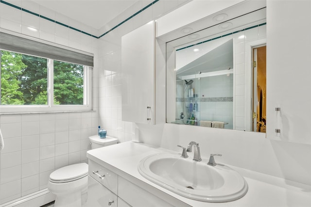 8 Wichard Blvd, Commack, NY 11725 - bathroom featuring baseboard heating, a shower stall, vanity, toilet, and tile walls
