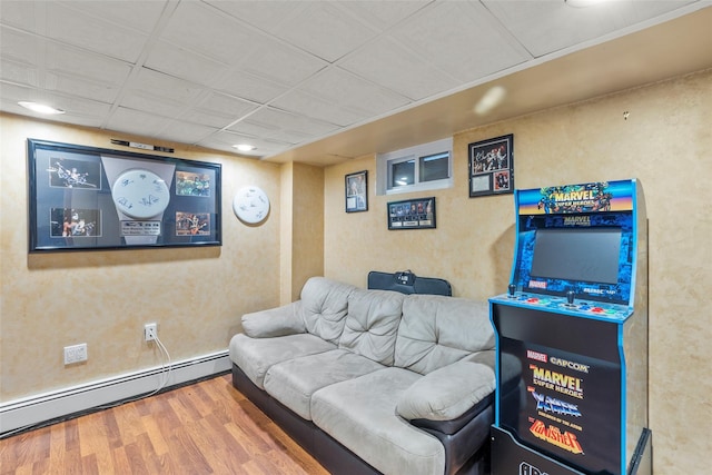 8 Wichard Blvd, Commack, NY 11725 - rec room featuring a baseboard radiator and wood finished floors