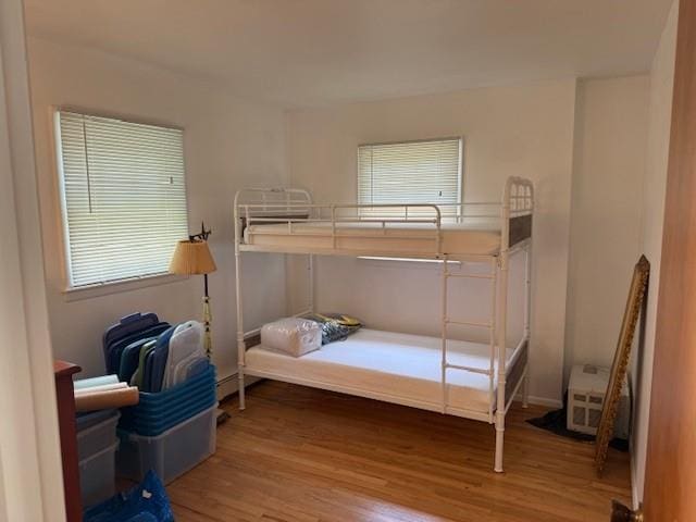 bedroom with wood finished floors