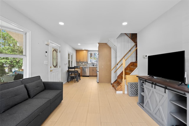 31 Wagon Ln E, Centereach, NY 11720 - living room featuring stairs and recessed lighting