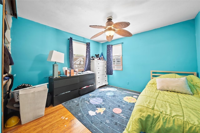 31 Wagon Ln E, Centereach, NY 11720 - bedroom featuring wood finished floors and ceiling fan